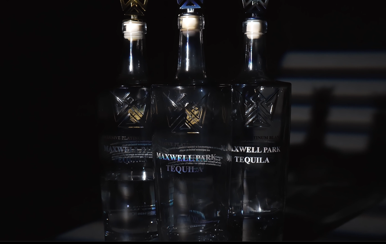 Maxwell Park bottle and glass on a bar top